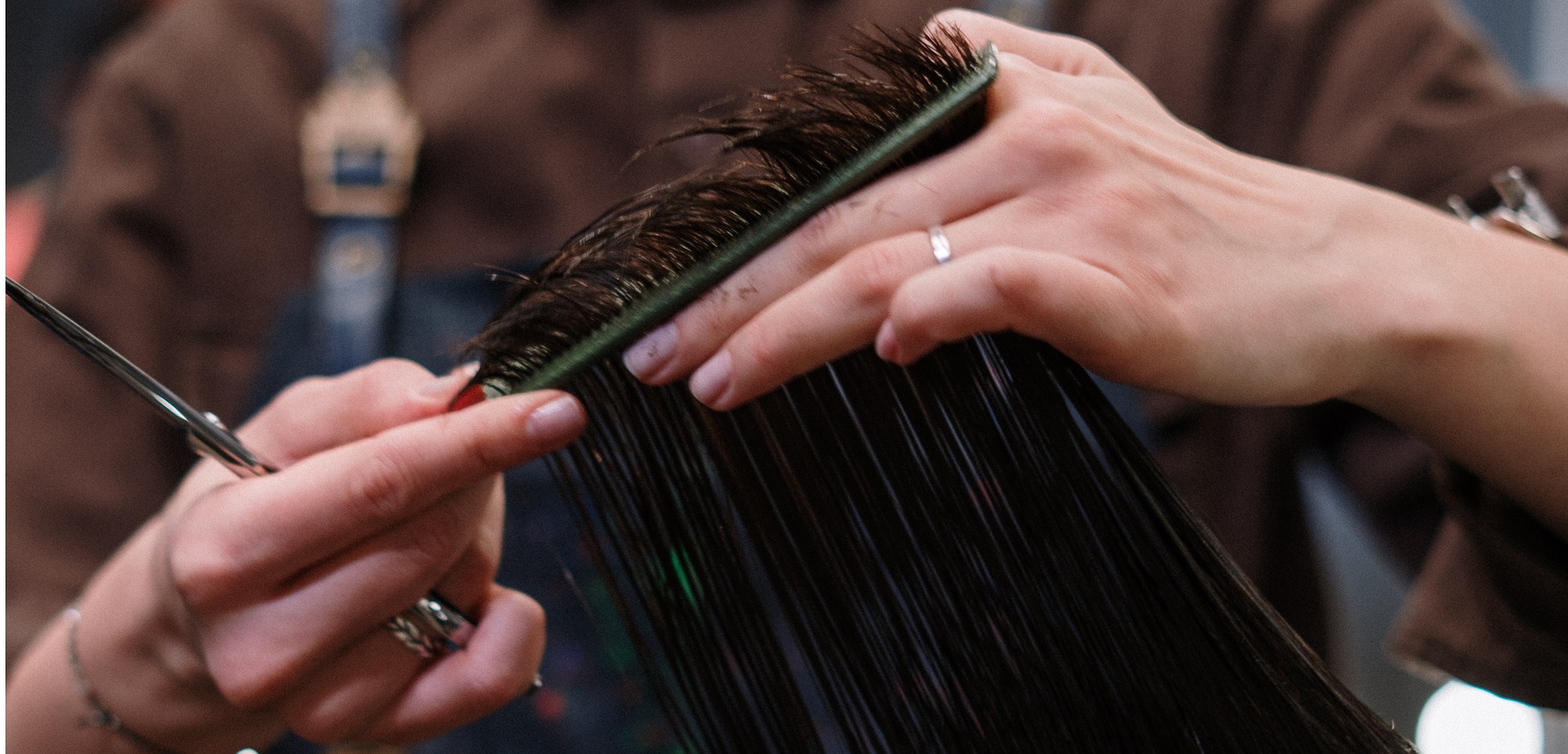 hairdresser giving a haircut